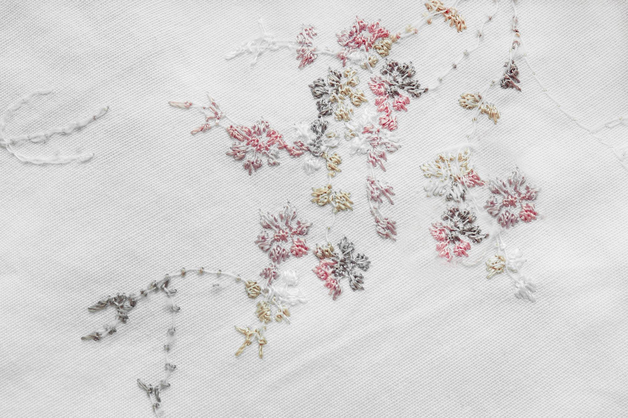 Delicate floral embroidery on linen
